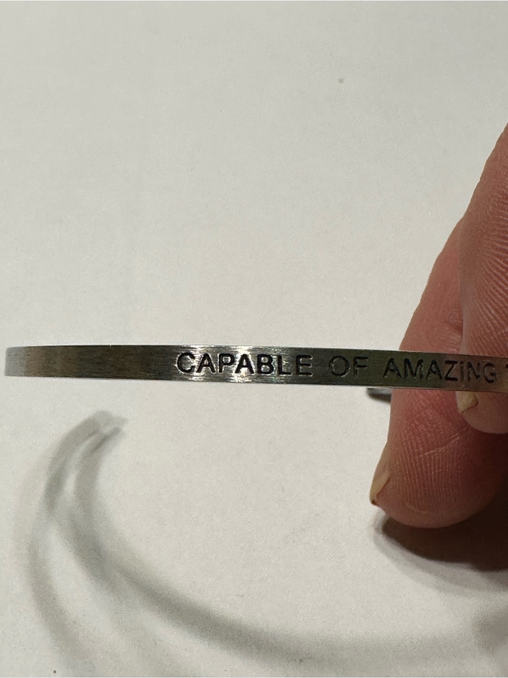 Silver Inspirational Metal Bangle Bracelet - "Capable of Amazing Things"